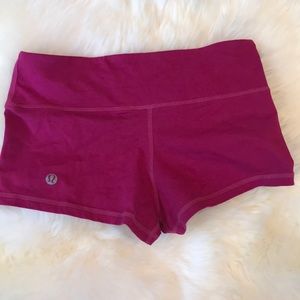 Pink Lululemon workout shorts